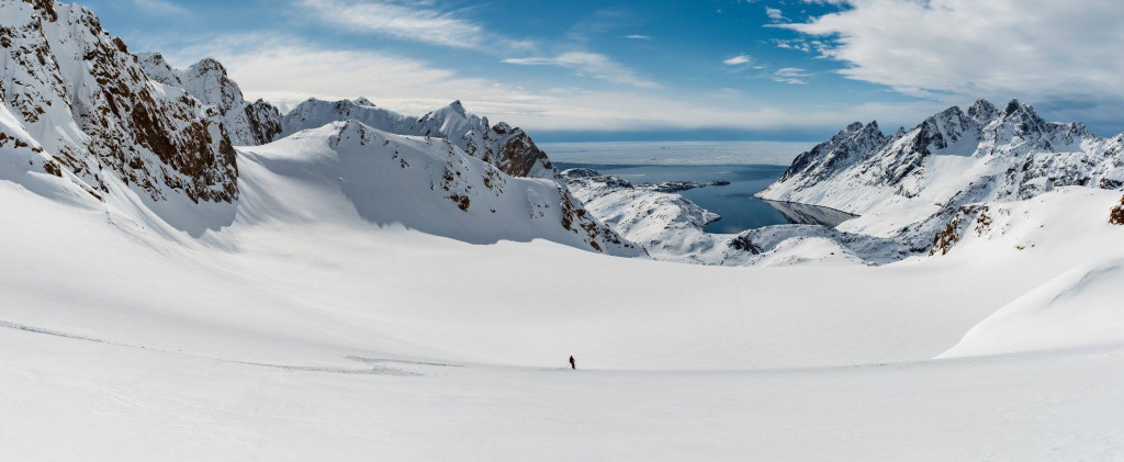 Small skier on a big glacier in Greenland